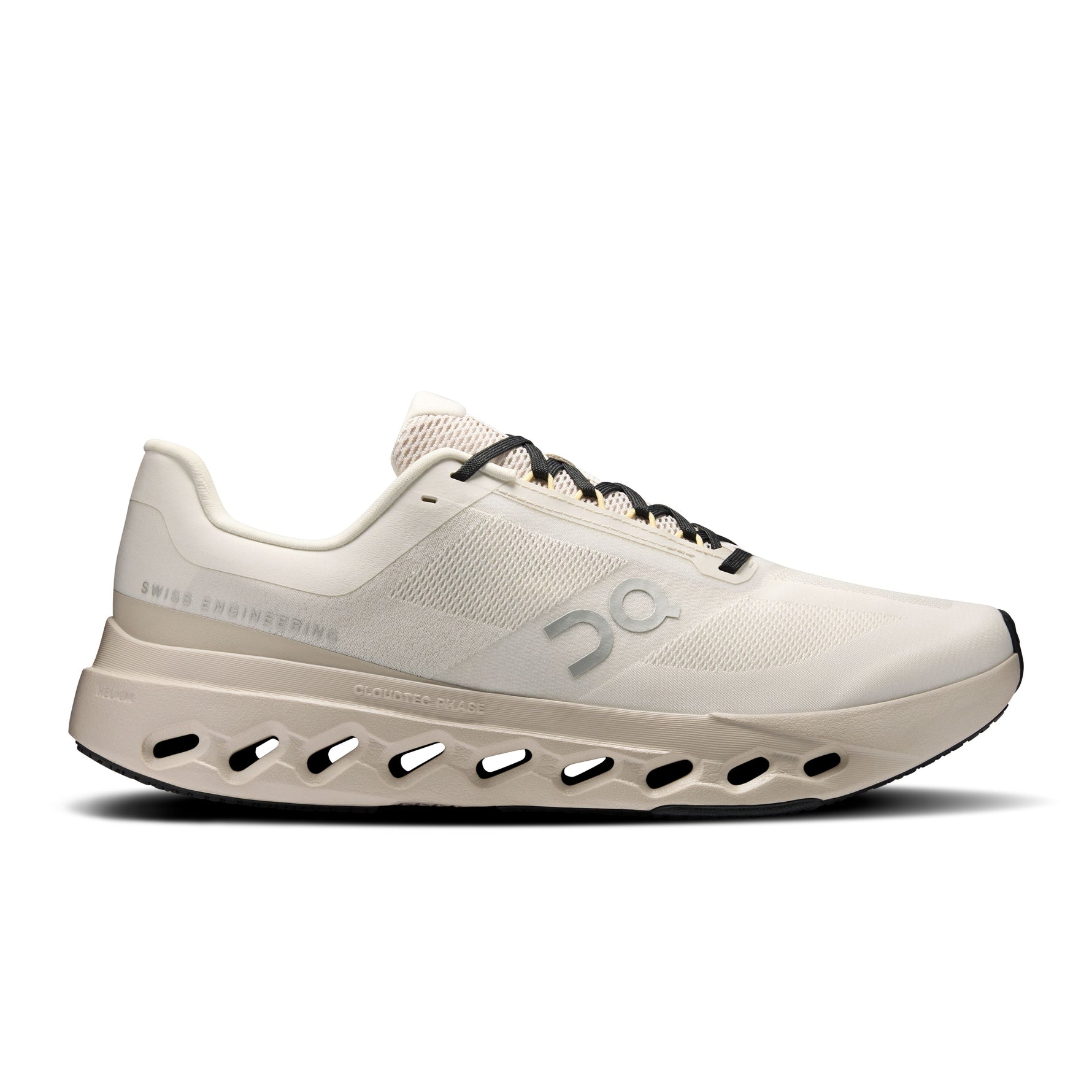 On Cloudsurfer Next running shoe in ivory and silver colorway with CloudTec sole