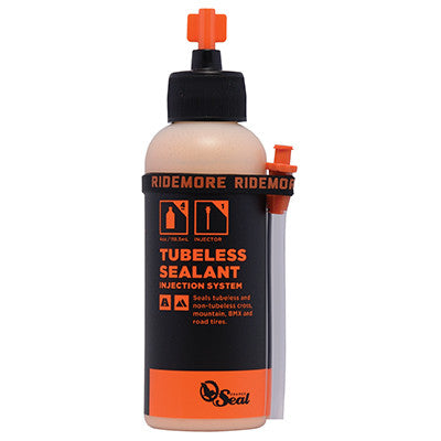 Orange Seal 4oz Tubeless Sealant with injection system, black bottle and orange branding