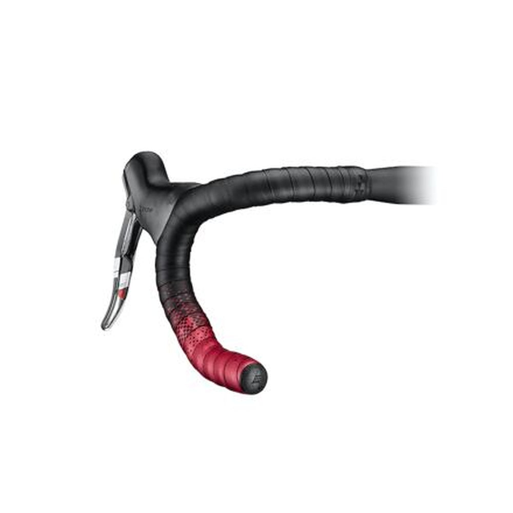 Ciclovation leather handlebar tape in black with ruby red accent section on bicycle handlebars
