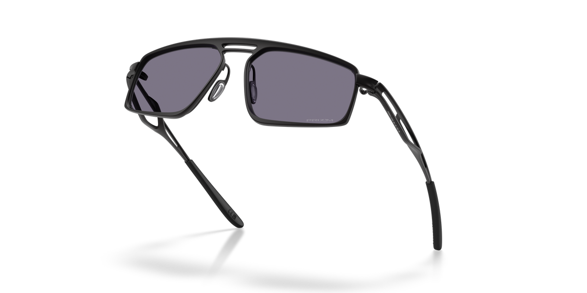 Oakley Bushwick sunglasses angled side view highlighting temple design and grey Prizm lenses
