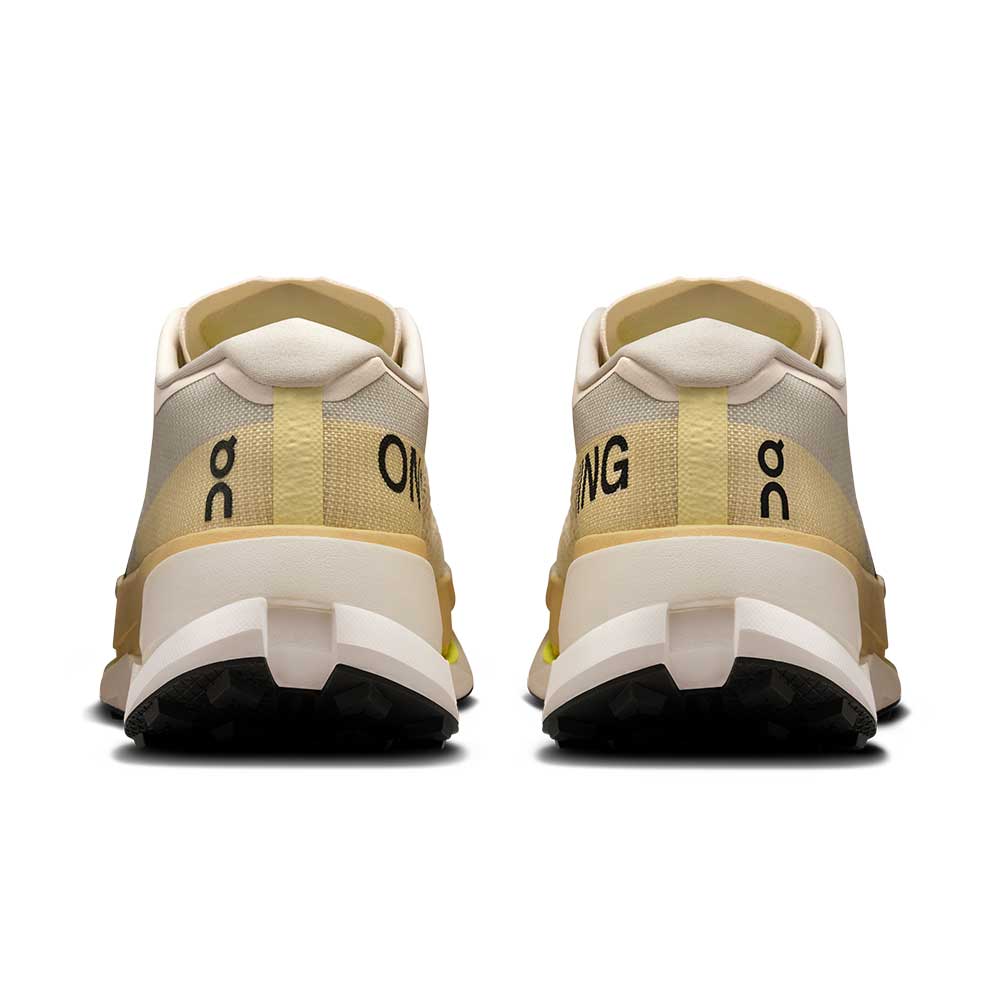 On Cloudultra Pro running shoes in pearl and lychee colorway, rear view
