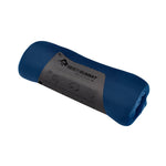 Sea To Summit Foam Core Pillow in navy blue with product label