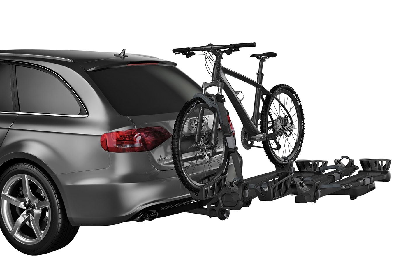 Thule T2 Pro XT bike rack mounted on car with bicycle loaded
