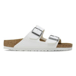 White Birkenstock Arizona two-strap sandals with cork footbed and white sole