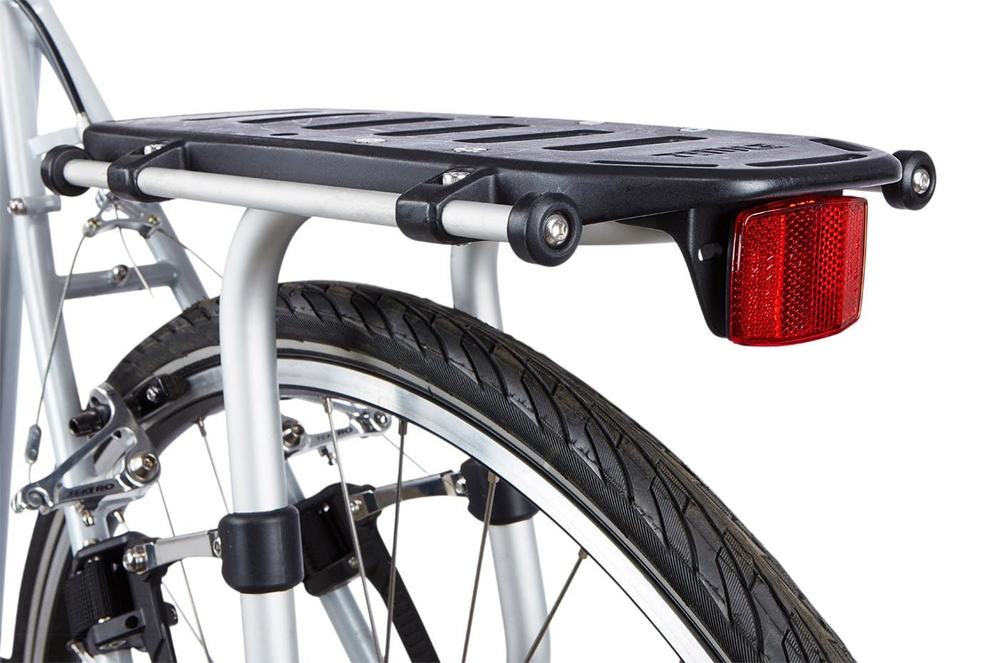 Black Thule Pack N Tour bike rack mounted on bicycle rear wheel