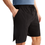Man wearing black On Focus Shorts with drawstring waist and side pockets