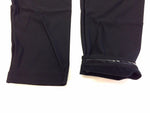 Black knee warmers showing two different cuff styles on clean white background