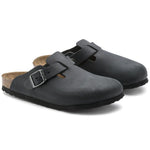 Black Birkenstock Boston oiled leather clogs with adjustable buckle straps