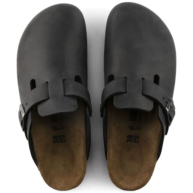 Black Birkenstock Boston oiled leather clogs with adjustable strap and cork footbed