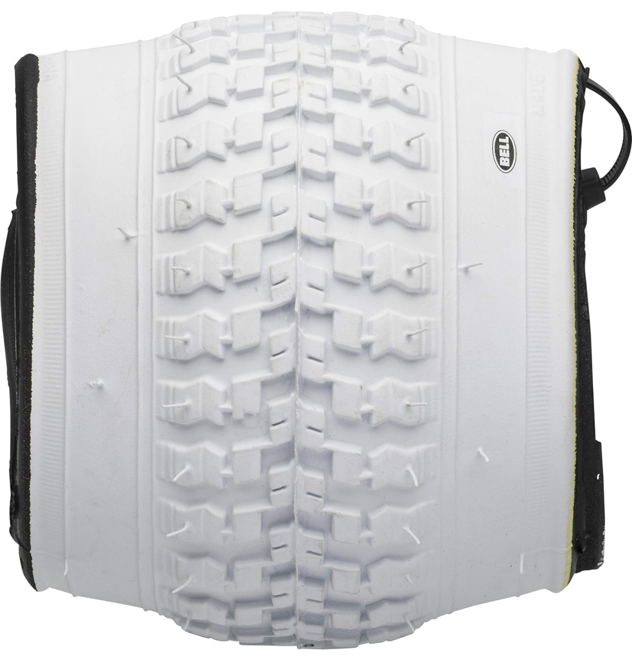 Bell white bicycle tire with knobby tread pattern on clean background