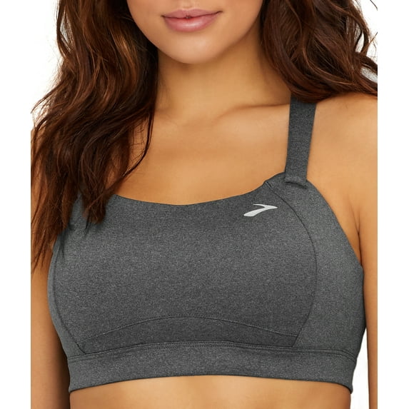 Woman wearing gray Brooks Juno sport bra with professional studio lighting