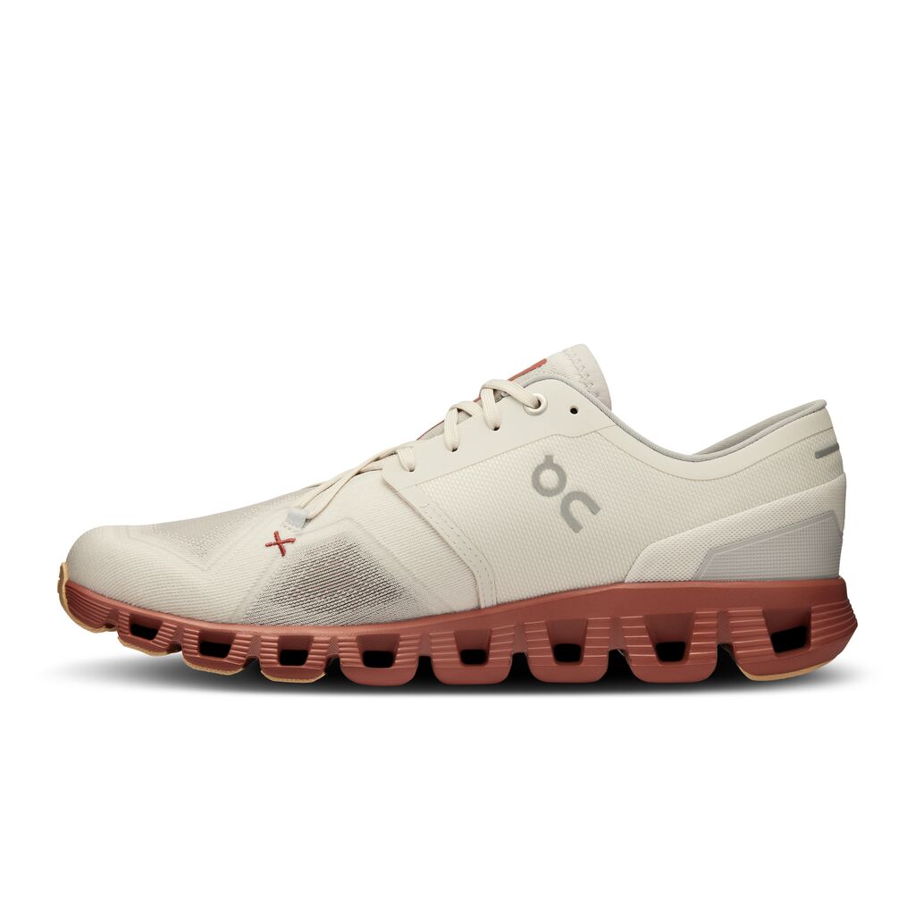 On Cloud X 3 running shoe in ice cream and auburn colorway side view