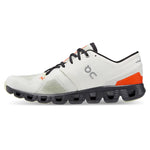 On Cloud X 3 running shoe in ivory with orange flame accents