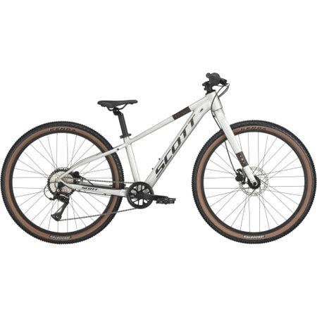 Scott Scale 600 alloy silver mountain bike side view with tan sidewall tires