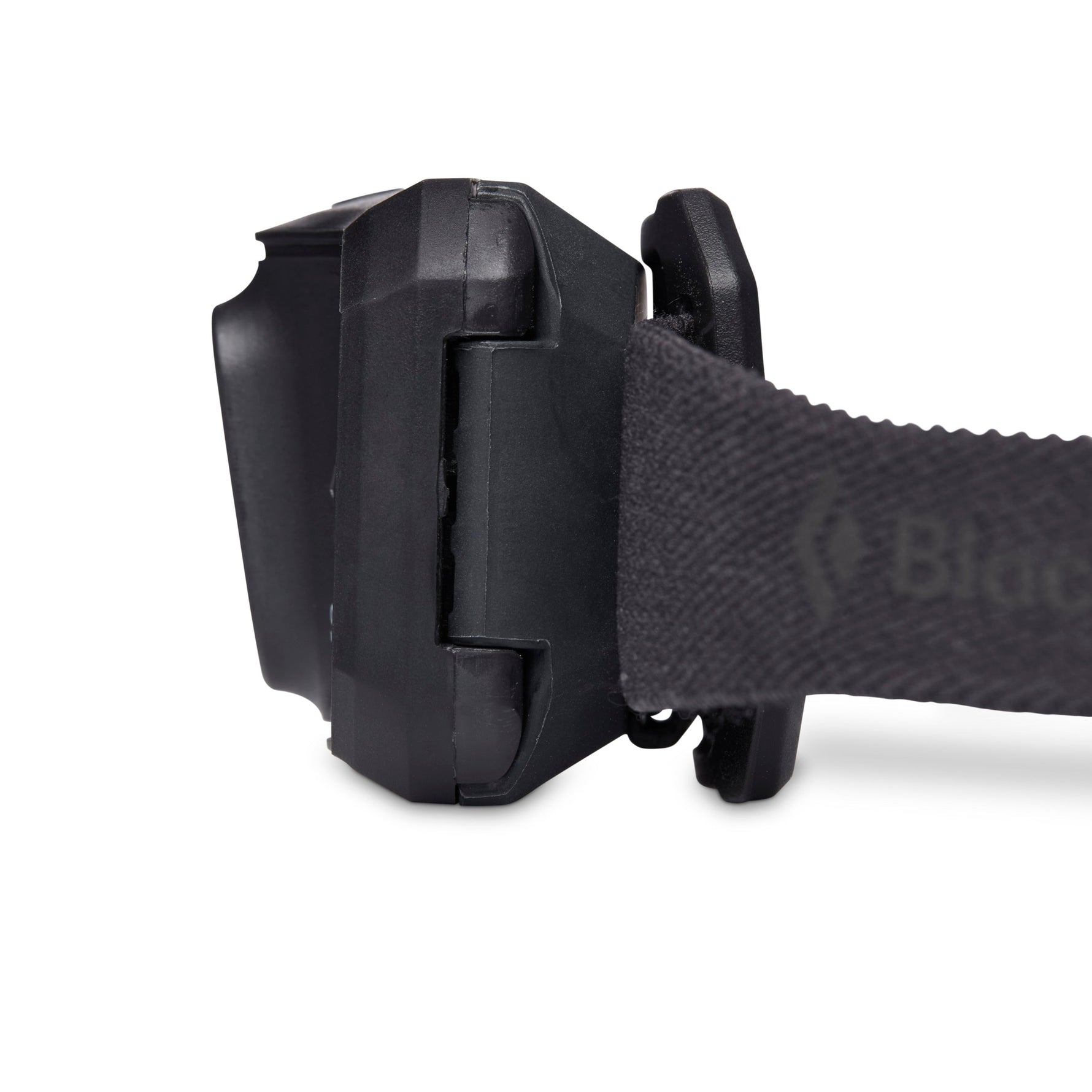 Black Diamond Storm Ops headlamp in black with adjustable strap on white background