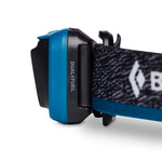 Black Diamond Astro 300 headlamp in blue and black with adjustable strap