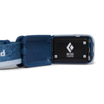 Black Diamond Astro 300 headlamp in blue with battery compartment open showing BD1500 battery