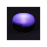 Black Diamond Moji R+ Lantern in black with purple LED light illuminated