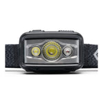 Close-up front view of Black Diamond Storm headlamp in black showing three LED lenses