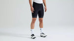 Specialized Foundation men's black cycling shorts worn with white Specialized shoes and socks