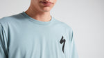 Man wearing light blue Specialized long sleeve t-shirt with black S logo