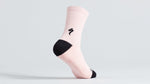 Specialized tall cycling sock in light pink with black accents and logo
