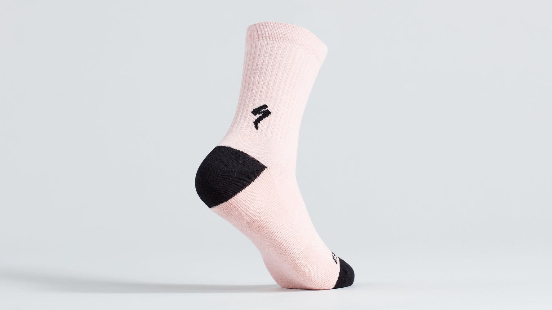 Specialized tall cycling sock in light pink with black accents and logo