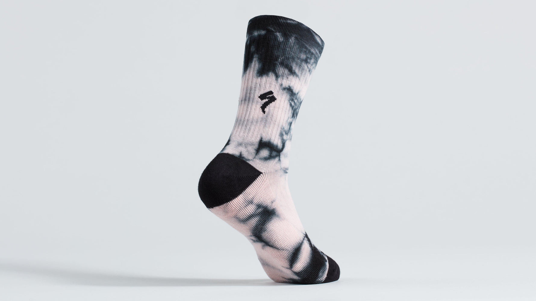 Specialized tall sock with tie-dye pattern in pink and black colors
