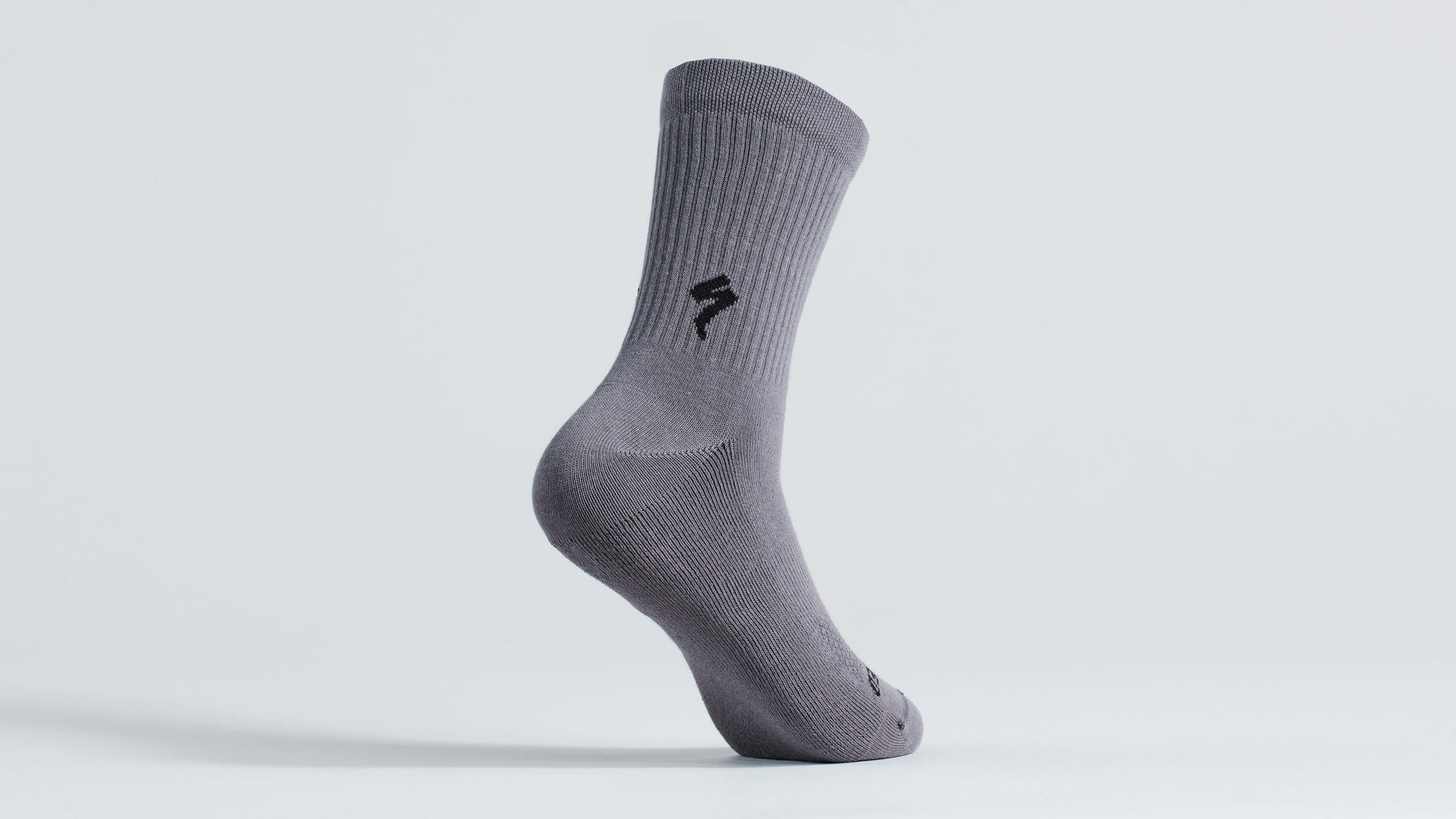 Gray Specialized cycling sock with ribbed design and brand logo on clean white background