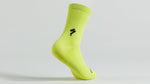 Specialized bright yellow tall cycling sock with black logo on clean studio background