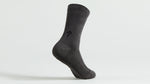 Dark gray ribbed tall cycling sock with subtle logo branding