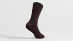 Dark brown ribbed tall cycling sock on clean white background