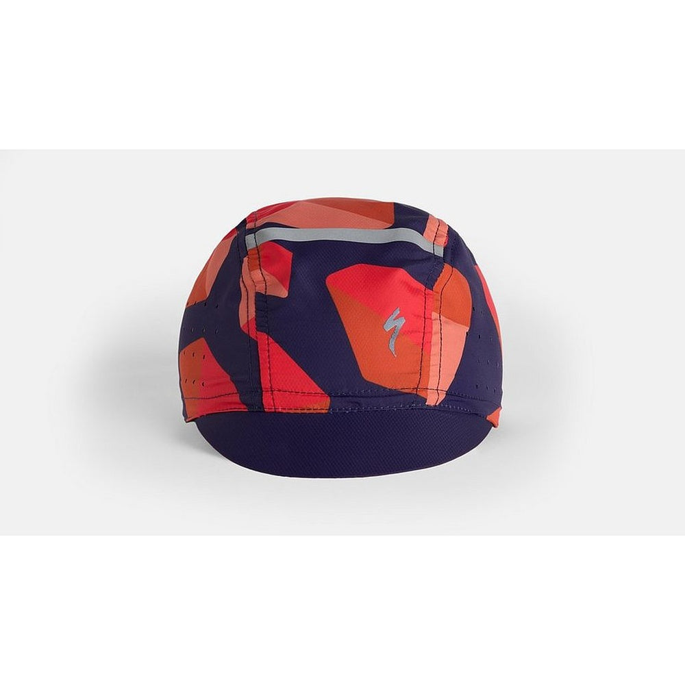 Specialized cycling cap in navy with red geometric pattern on white background
