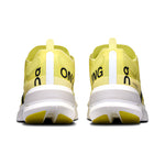 On Cloudboom Strike running shoes in limelight yellow colorway, rear view showing heel design