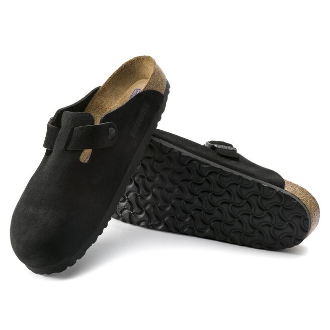 Black Birkenstock Boston clogs with suede upper and cork footbed shown from side angle