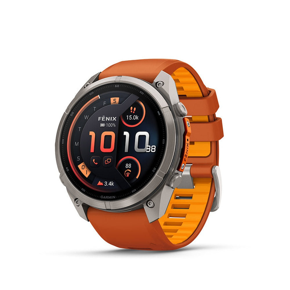Garmin Fenix 9 Pro smartwatch with titanium case and orange silicone band on white background