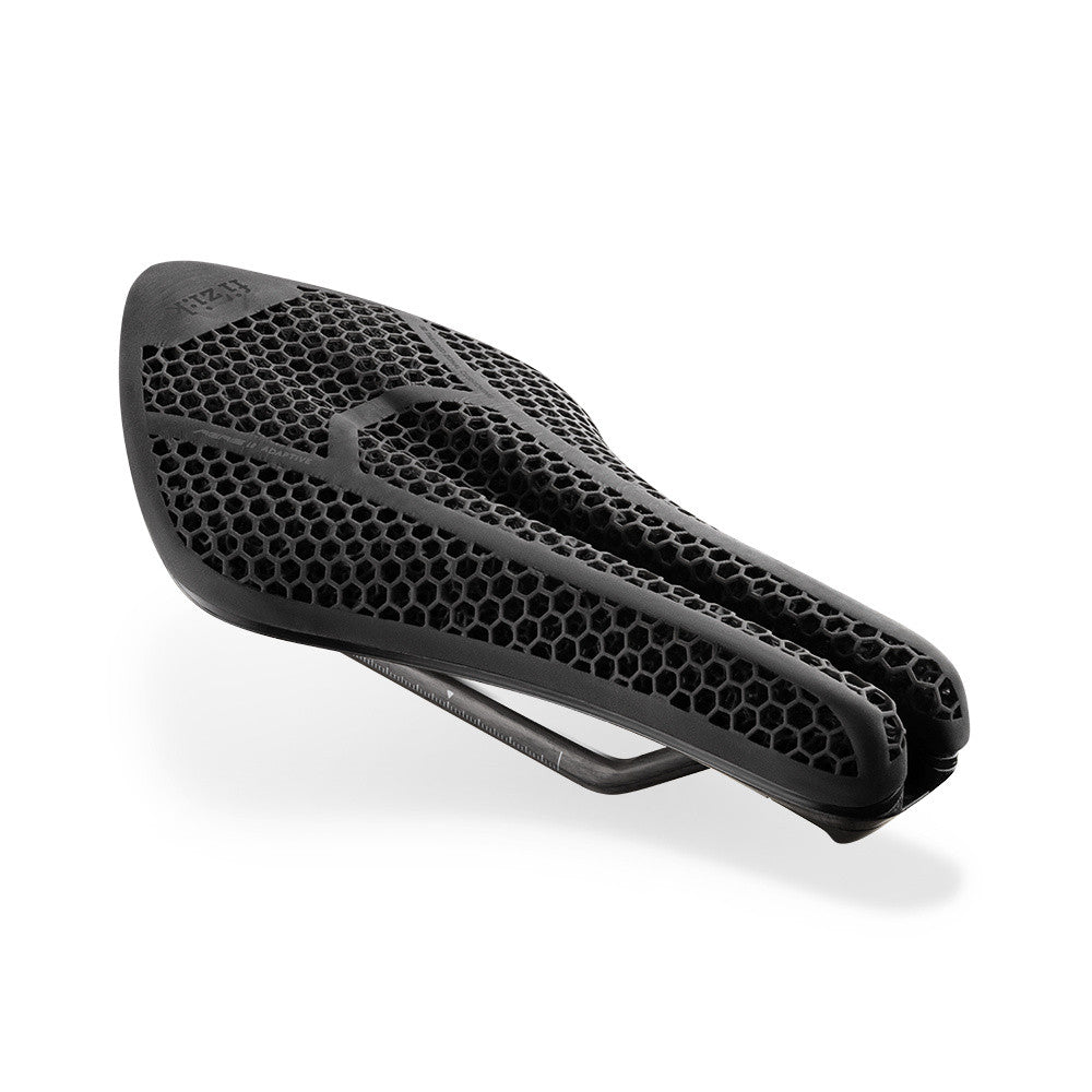 Fizik Transiro Aeris bike saddle with black honeycomb pattern and ventilation channels