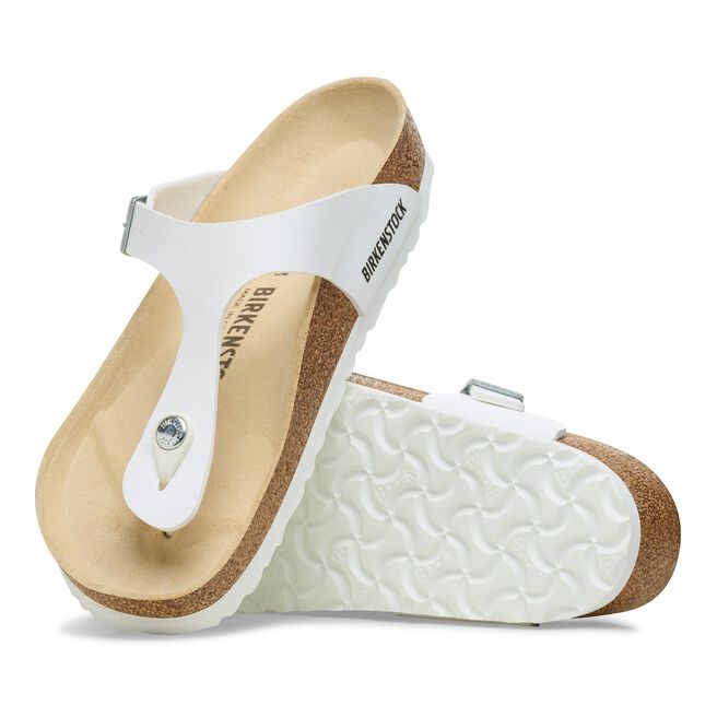 White Birkenstock Gizeh sandals with thong strap and cork footbed