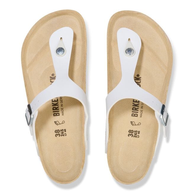 White Birkenstock Gizeh sandals with Birko-Flor straps and cork footbed