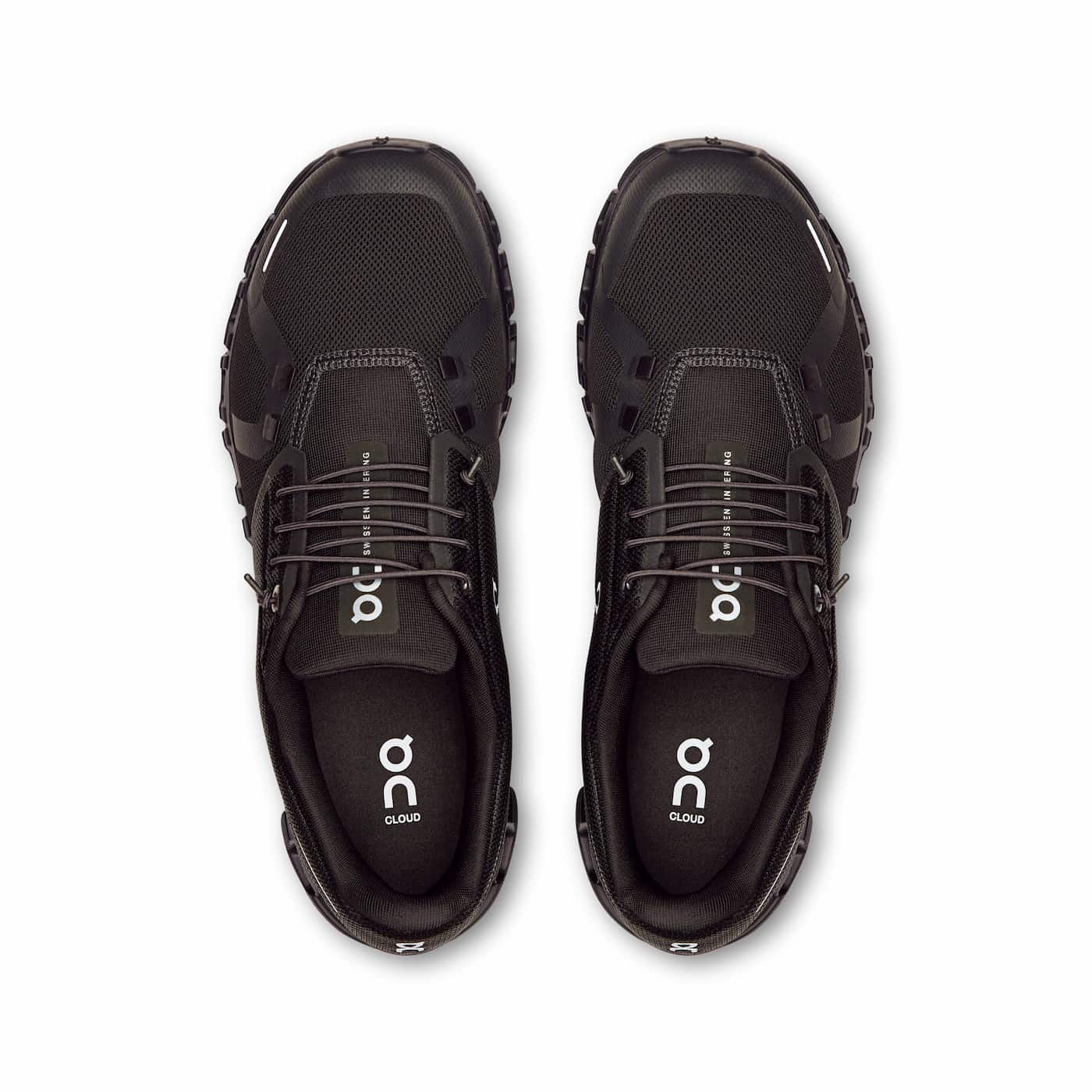 On Cloud 6 running shoes in black with white accents, top view pair