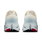 On Cloudsurfer Max women's running shoes in ivory and arctic blue colorway, rear view