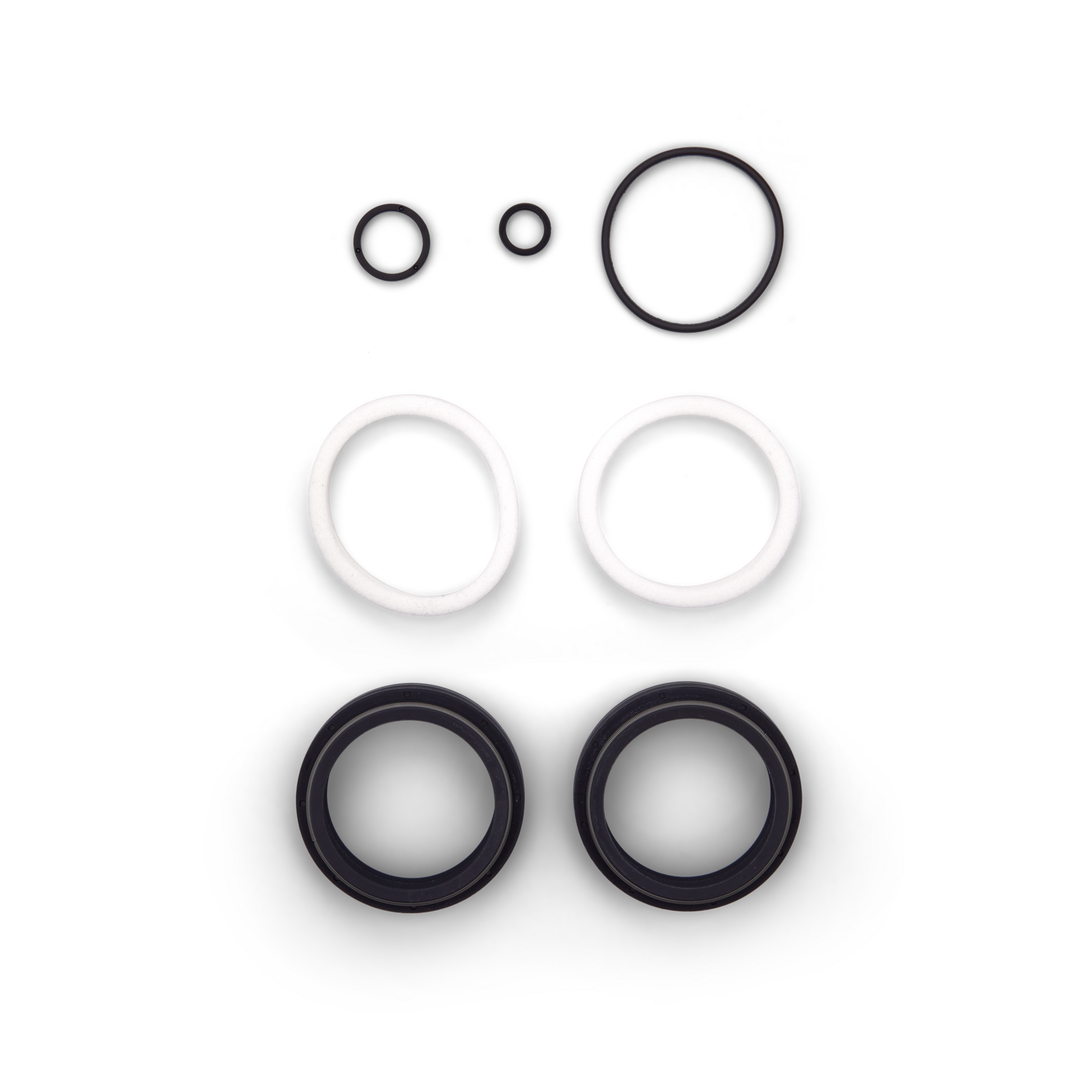 Fox Factory fork dust wiper kit with black o-rings and white seals on white background