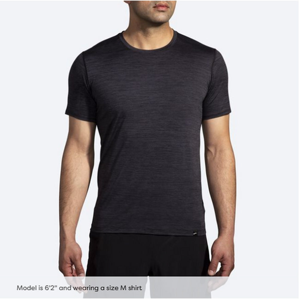 Brooks Luxe Short Sleeve shirt in heather black worn by male model on white background