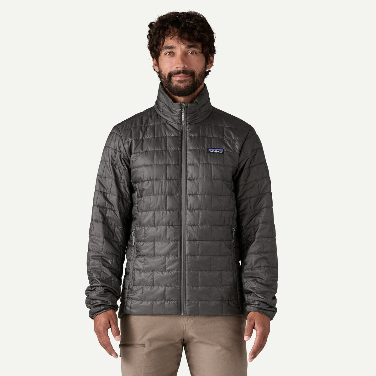 Patagonia Nano Puff Jacket in Forge Grey worn by male model, front view
