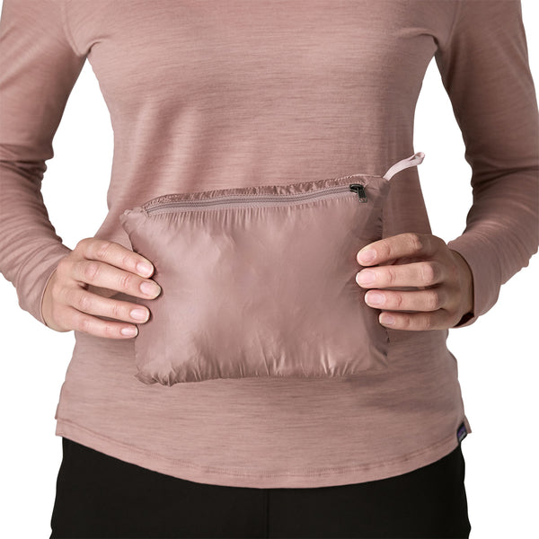 Patagonia Nano Puff Jacket packed into its own stuff sack in Stingray Mauve colorway