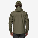 Back view of man wearing Patagonia Boulder Fork Rain Jacket in Basin Green