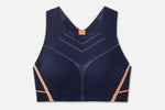 Brooks Dare Strappy Bra in navy blue with orange nectar accent trim