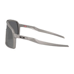 Oakley Sutro sunglasses with grey silver frame and dark lenses side view