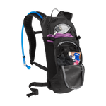CamelBak Lobo 9 black hydration backpack with multiple compartments open showing contents