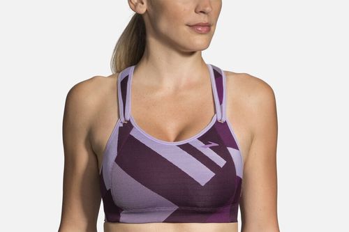 Brooks Rebound Racer Sport Bra in violet purple with geometric pattern worn by model